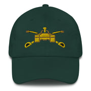 A spruce colored Army Armor Hat with the logo on the front.  The hat has a curved visor and an adjustable strap at the back.