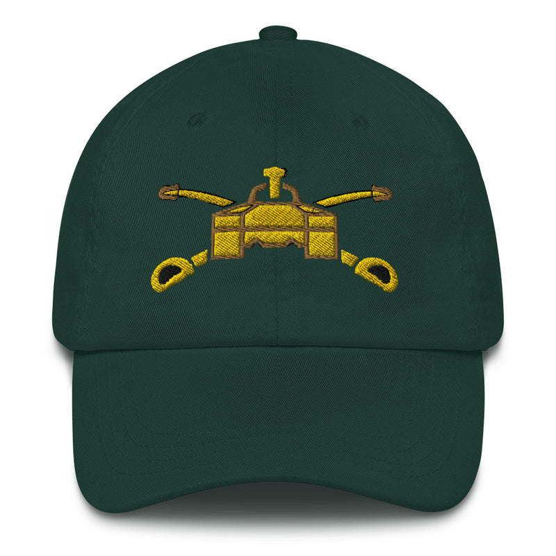 A spruce colored Army Armor Hat with the logo on the front.  The hat has a curved visor and an adjustable strap at the back.