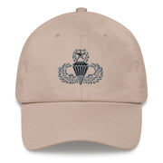 A stone colored Master Parachutist Hat with the logo on the front.  The hat has a curved visor and an adjustable strap at the back.