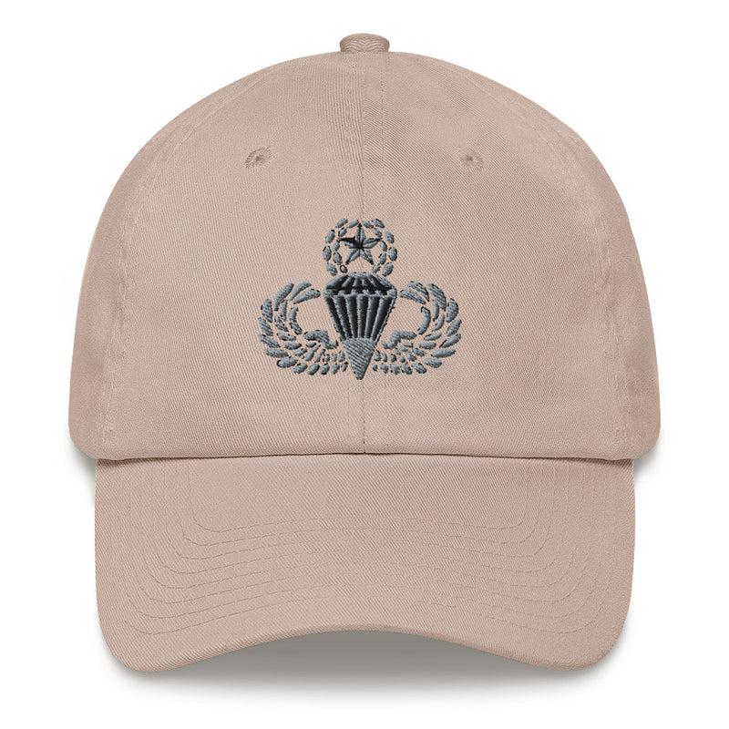 A stone colored Master Parachutist Hat with the logo on the front.  The hat has a curved visor and an adjustable strap at the back.