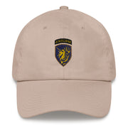 A stone colored 13th Airborne Division Hat with the logo on the front.  The hat has a curved visor and an adjustable strap at the back.