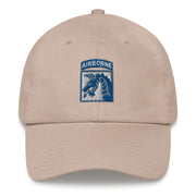 A stone colored XVIII Airborne Corps Hat with the logo on the front.  The hat has a curved visor and an adjustable strap at the back.