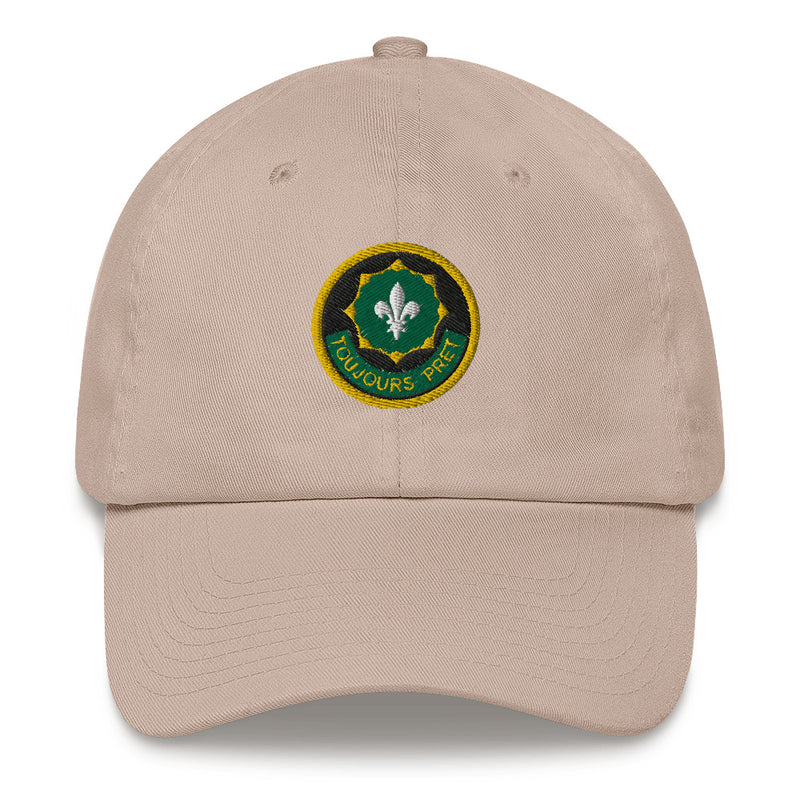 A stone colored 2nd-cavalry-regiment Hat with the logo on the front.  The hat has a curved visor and an adjustable strap at the back.