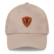 A stone colored 5th Marine Division Hat with the logo on the front.  The hat has a curved visor and an adjustable strap at the back.