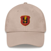 A stone colored 9th Regiment Hat with the logo on the front.  The hat has a curved visor and an adjustable strap at the back.