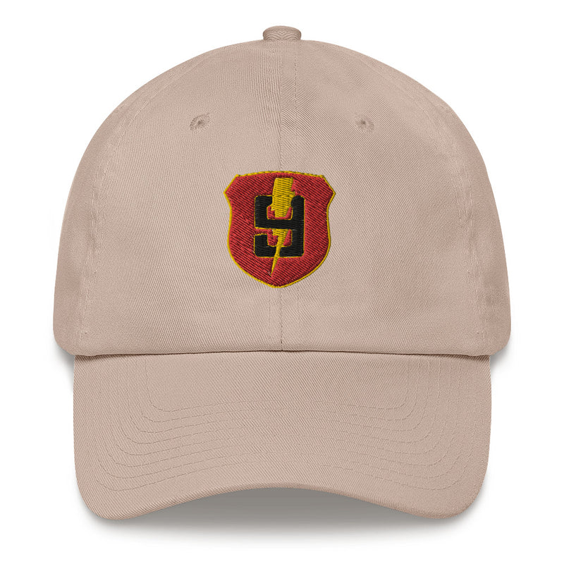 A stone colored 9th Regiment Hat with the logo on the front.  The hat has a curved visor and an adjustable strap at the back.