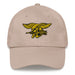 A stone colored Navy Seals Hat with the logo on the front.  The hat has a curved visor and an adjustable strap at the back.