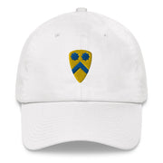 A white 2nd Cavalry Division Hat with the logo on the front.  The hat has a curved visor and an adjustable strap at the back.
