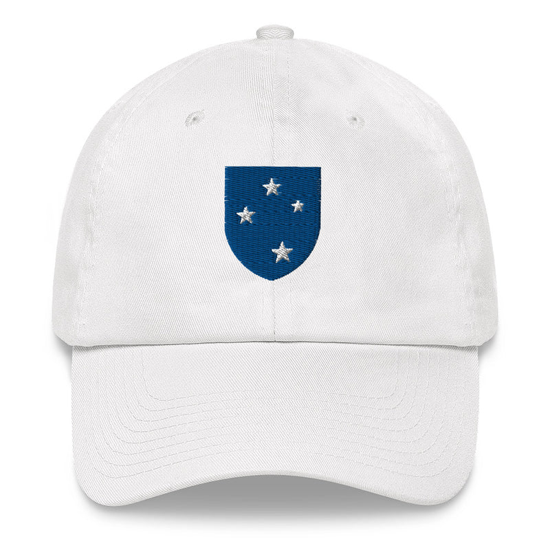 A white 23rd Infantry Division Hat with the logo on the front.  The hat has a curved visor and an adjustable strap at the back.