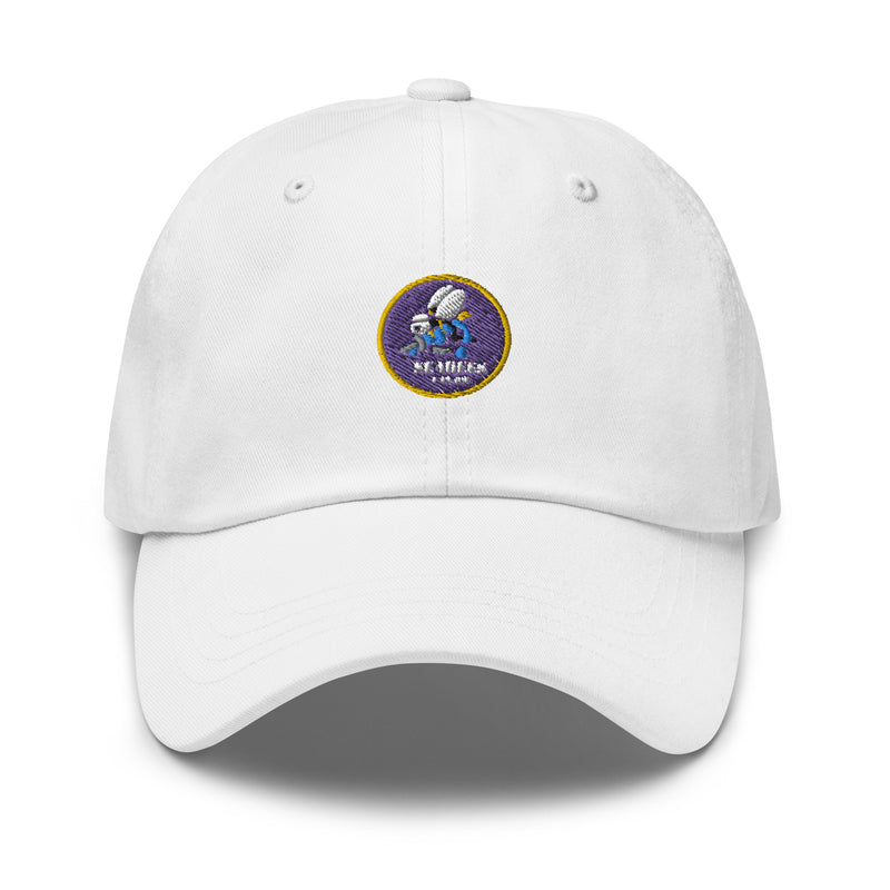 A white Navy Seabees Hat with the logo on the front.  The hat has a curved visor and an adjustable strap at the back.