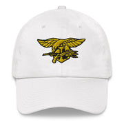 A white Navy Seals Hat with the logo on the front.  The hat has a curved visor and an adjustable strap at the back.