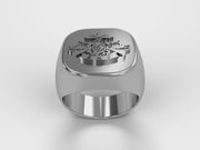 A video illustrating a sleek silver men's military style signet ring with a raised Fleet Marine Forces (FMF) Badge logo rotating on a 360 degree turn table.