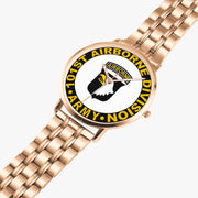 The 101st Airborne Division Goldtone Watch is displayed in a perspective view on a white background with the gold metal strap stretched out.