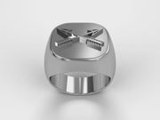 A video illustrating a sleek silver men's military style signet ring with a raised Special Forces Badge Ring Badge logo rotating on a 360 degree turn table.