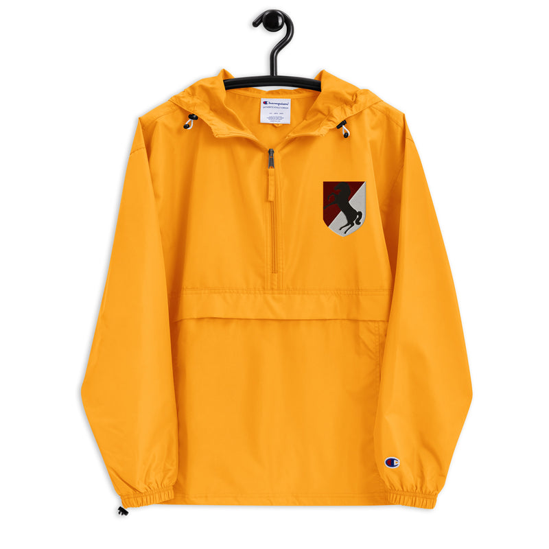 11th Armored Cavalry Regiment Gold Champion packable jacket with a detailed embroidered logo