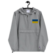 Ukrainian Flag Graphite Champion packable jacket with a detailed embroidered logo