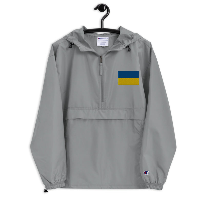 Ukrainian Flag Graphite Champion packable jacket with a detailed embroidered logo