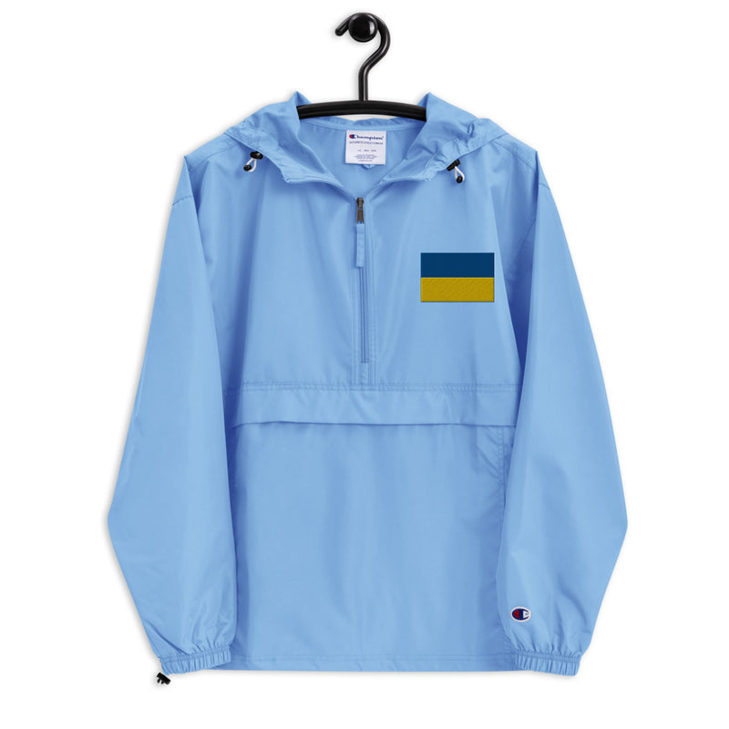 Ukrainian Flag Light Blue Champion packable jacket with a detailed embroidered logo