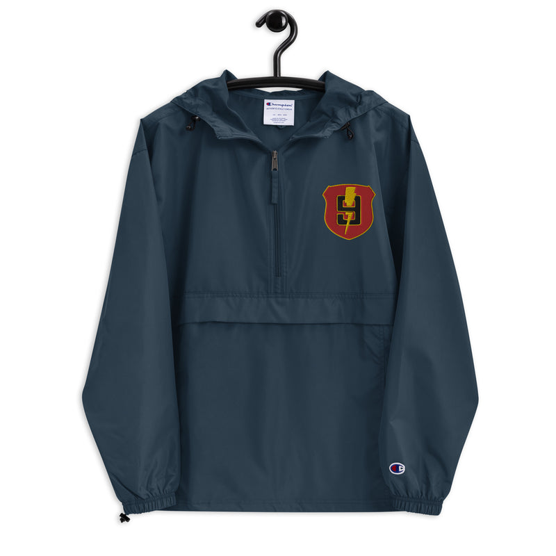 9th Regiment Navy Champion packable jacket with a detailed embroidered logo