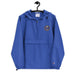 Navy Seabees Royal Blue Champion packable jacket with a detailed embroidered logo