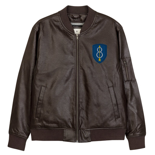 The 8th Infantry Division Embroidered Brown Leather Bomber Jacket featuring a front zipper, front pockets, and a small zippered pocket on the left sleeve.