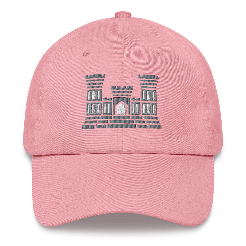 A pink Combat Engineer Hat with the logo on the front.  The hat has a curved visor and an adjustable strap at the back.