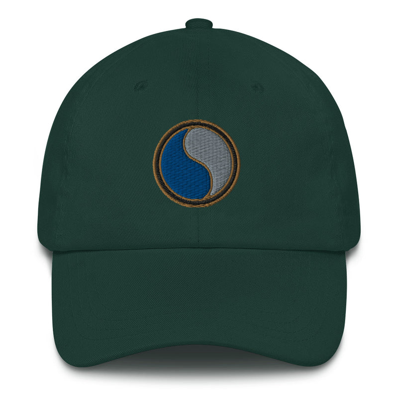 A spruce colored 29th Infantry Division Hat with the logo on the front.  The hat has a curved visor and an adjustable strap at the back.