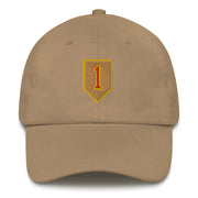 A khaki colored 1st Infantry Division Hat with the logo on the front.  The hat has a curved visor and an adjustable strap at the back.