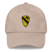 A stone colored 1st Cavalry Division Hat with the logo on the front.  The hat has a curved visor and an adjustable strap at the back.