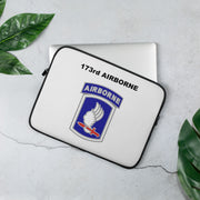 A lightweight and water-resistant white Laptop Sleeve with the 173rd Airborne Brigade logo printed on top. The laptop sleeve is designed to fit a 13" laptop.
