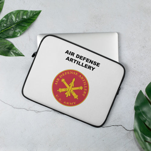 A lightweight and water-resistant white Laptop Sleeve with the Air Defense Artillery logo printed on top. The laptop sleeve is designed to fit a 13" laptop.