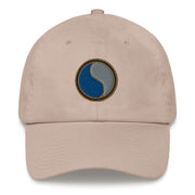 A stone colored 29th Infantry Division Hat with the logo on the front.  The hat has a curved visor and an adjustable strap at the back.