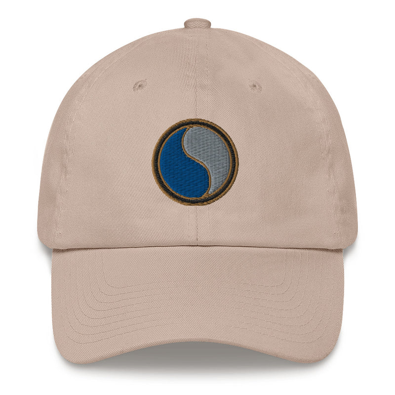 A stone colored 29th Infantry Division Hat with the logo on the front.  The hat has a curved visor and an adjustable strap at the back.