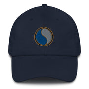 A navy blue 29th Infantry Division Hat with the logo on the front.  The hat has a curved visor and an adjustable strap at the back.