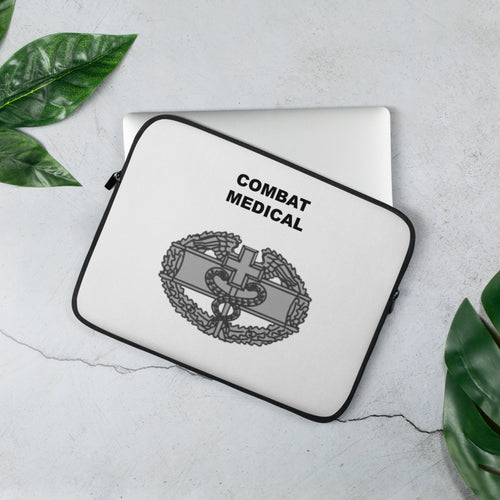 A lightweight and water-resistant white Laptop Sleeve with the Combat Medical logo printed on top. The laptop sleeve is designed to fit a 13" laptop.