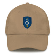 A khaki colored 8th Infantry Division Hat with the logo on the front.  The hat has a curved visor and an adjustable strap at the back.