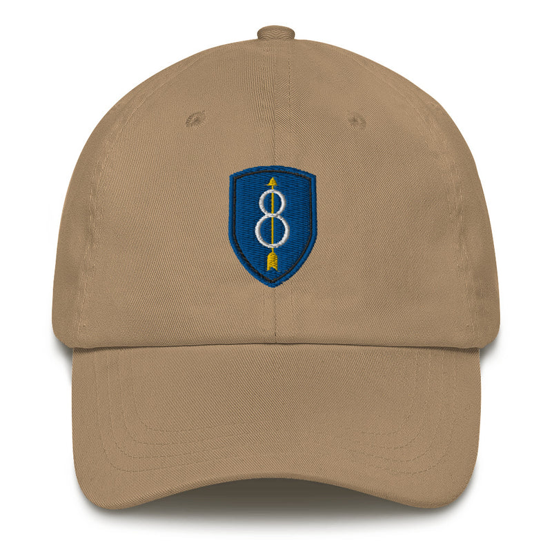 A khaki colored 8th Infantry Division Hat with the logo on the front.  The hat has a curved visor and an adjustable strap at the back.