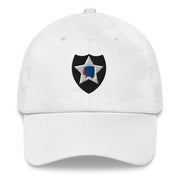 A white 2nd Infantry Division Hat with the logo on the front.  The hat has a curved visor and an adjustable strap at the back.