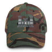 A military style Combat Engineer Hat with camouflage and the logo on the front.  The hat has a curved visor and an adjustable strap at the back. 