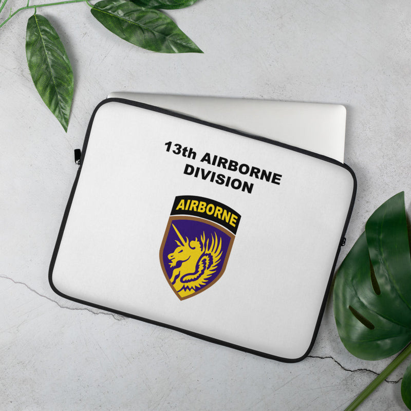 A lightweight and water-resistant white Laptop Sleeve with the 13th Airborne Division logo printed on top. The laptop sleeve is designed to fit a 15" laptop.