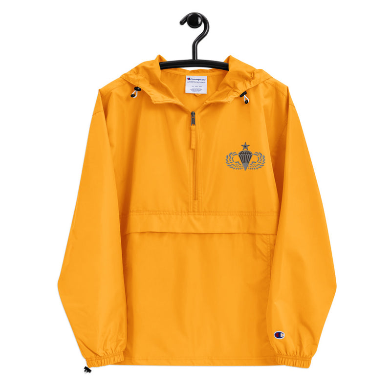 Senior Parachutist Gold Champion packable jacket with a detailed embroidered logo.