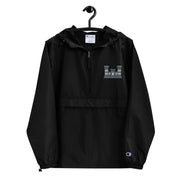 Combat Engineer Black Champion packable jacket with a detailed embroidered logo.