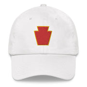 A white 28th Infantry Division Hat with the logo on the front.  The hat has a curved visor and an adjustable strap at the back.