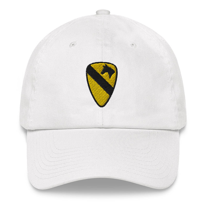 A white 1st Cavalry Division Hat with the logo on the front.  The hat has a curved visor and an adjustable strap at the back.