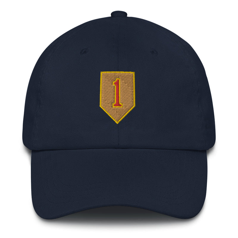 A navy blue 1st Infantry Division Hat with the logo on the front.  The hat has a curved visor and an adjustable strap at the back.