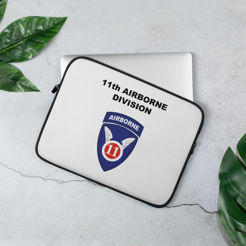 A lightweight and water-resistant white Laptop Sleeve with the 11th Airborne Division logo printed on top. The laptop sleeve is designed to fit a 13" laptop.