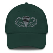A spruce colored Basic Parachutist Hat with the logo on the front.  The hat has a curved visor and an adjustable strap at the back.
