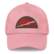 A pink 78th Infantry Division Hat with the logo on the front.  The hat has a curved visor and an adjustable strap at the back.