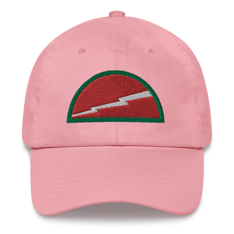 A pink 78th Infantry Division Hat with the logo on the front.  The hat has a curved visor and an adjustable strap at the back.