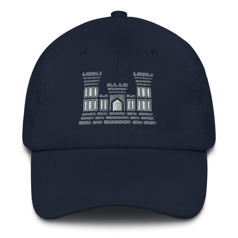 A navy blue Combat Engineer Hat with the logo on the front.  The hat has a curved visor and an adjustable strap at the back.